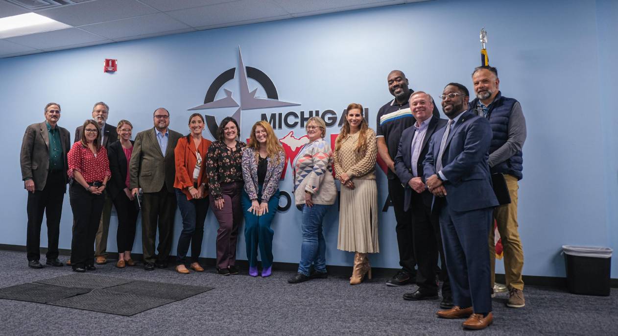 a diverse group of people smiling